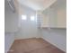 Walk-in closet with built in shelving at 45113 W Buckhorn Trl, Maricopa, AZ 85139