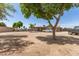 Large backyard offering plenty of room for parking and recreational activities at 4712 W Juniper Ave, Glendale, AZ 85306