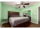 Relaxing bedroom with neutral walls, a comfortable bed, and sliding mirror closet doors at 4712 W Juniper Ave, Glendale, AZ 85306