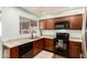 Bright kitchen featuring modern appliances, countertop space, and updated cabinets at 4712 W Juniper Ave, Glendale, AZ 85306