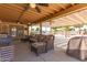 Spacious covered patio with ample seating, ideal for relaxing outdoors at 4712 W Juniper Ave, Glendale, AZ 85306