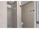 Bathroom featuring a glass-enclosed shower with decorative tile at 4918 N 74Th St, Scottsdale, AZ 85251