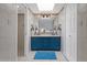Bathroom with double sink vanity, modern fixtures, and bright lighting at 4918 N 74Th St, Scottsdale, AZ 85251