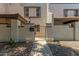 Charming front entrance with gated courtyard, mailbox and well-maintained landscape with stone at 4918 N 74Th St, Scottsdale, AZ 85251