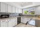 Bright kitchen with granite counters, stainless steel appliances, tile backsplash and plenty of cabinets at 4918 N 74Th St, Scottsdale, AZ 85251