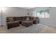 Comfortable living room with sectional seating, large window and area rug at 4918 N 74Th St, Scottsdale, AZ 85251