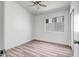 Bedroom featuring hard surface floors, a ceiling fan, and a window at 5125 E Juana Ct, Cave Creek, AZ 85331