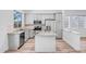 Modern kitchen featuring granite countertops, stainless steel appliances, and island at 5125 E Juana Ct, Cave Creek, AZ 85331