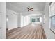 Bright, open-concept living space with sleek wood floors and modern architectural details at 5125 E Juana Ct, Cave Creek, AZ 85331