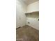 Laundry room with tile flooring and utility connections at 5374 N Ormondo Way, Litchfield Park, AZ 85340