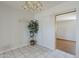 Cozy dining area with tile floor and natural light offers a comfortable meal space at 5618 E Des Moines St, Mesa, AZ 85205