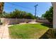 Expansive backyard offers a private outdoor retreat with a well-maintained lawn and potential for landscaping at 606 W 15Th St, Tempe, AZ 85281