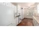 Bright kitchen with white appliances, tiled floor, and ample cabinet space at 606 W 15Th St, Tempe, AZ 85281