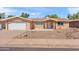 Charming single-story home with a well-maintained desert-landscaped front yard and attached two-car garage at 636 S Rosemont --, Mesa, AZ 85206