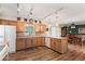 Charming kitchen with ample cabinet space, tile backsplash, and an eat-in island at 636 S Rosemont --, Mesa, AZ 85206