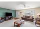 Bright living room with a plush sofa and a large window for ample natural light at 636 S Rosemont --, Mesa, AZ 85206
