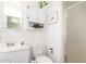 Neat bathroom with a sink, toilet, and shower stall, providing essential amenities in a compact space at 6749 E Lewis Ave, Scottsdale, AZ 85257