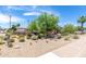 Desert landscaping with mature trees and cacti in front yard at 6749 E Lewis Ave, Scottsdale, AZ 85257