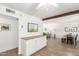 Open-concept living area with hardwood floors, leading to living room, dining room and kitchen at 6749 E Lewis Ave, Scottsdale, AZ 85257