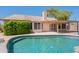 Inviting backyard pool and covered patio with a nice flow to the house at 7345 E Forge Ave, Mesa, AZ 85208