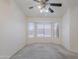 Well-lit bedroom featuring a bay window and a ceiling fan at 7345 E Forge Ave, Mesa, AZ 85208