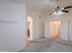 Open bedroom area features closet space and access to other rooms at 7345 E Forge Ave, Mesa, AZ 85208