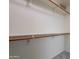 A standard reach in closet featuring clothes rod and shelving for maximum storage at 7345 E Forge Ave, Mesa, AZ 85208