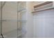 Spacious walk-in closet featuring wire shelving and a hanging rod at 7345 E Forge Ave, Mesa, AZ 85208