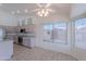 Eat-in kitchen featuring recessed lighting, stainless appliances, and an abundance of cabinets at 7345 E Forge Ave, Mesa, AZ 85208