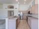 Spacious kitchen featuring bar seating, stainless appliances, and ample cabinet space at 7345 E Forge Ave, Mesa, AZ 85208