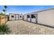 Outdoor shed offers lots of extra storage space with desert landscaping and a fenced area to protect your privacy at 7711 E Farmdale Ave, Mesa, AZ 85208