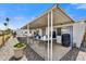 Wide covered patio with ample space for outdoor dining and relaxing at 7711 E Farmdale Ave, Mesa, AZ 85208