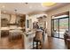 Modern kitchen with custom cabinets, granite countertops, and stainless-steel appliances at 7731 E Soaring Eagle Way, Scottsdale, AZ 85266