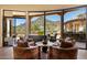 Comfortable seating area with scenic views of the mountains and pool at 7731 E Soaring Eagle Way, Scottsdale, AZ 85266