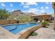 Stunning pool and patio with desert landscaping and mountain views at 7731 E Soaring Eagle Way, Scottsdale, AZ 85266