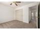 Bedroom with sliding door closet and neutral color palette at 82 N 221St Ave, Buckeye, AZ 85326