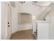 Well-lit foyer with hardwood flooring and staircase with neutral carpet at 82 N 221St Ave, Buckeye, AZ 85326