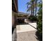 A backyard with a covered patio featuring an outdoor seating area surrounded by plants and pavers at 8355 E Via De Encanto --, Scottsdale, AZ 85258