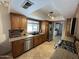Modern kitchen with stainless steel appliances, granite countertops, and custom cabinetry at 8355 E Via De Encanto --, Scottsdale, AZ 85258