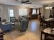 Open concept living room, dining and kitchen area with tile floors and natural light at 8355 E Via De Encanto --, Scottsdale, AZ 85258
