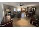 Open concept living space featuring tiled flooring, inviting seating, and a decorative fireplace at 8355 E Via De Encanto --, Scottsdale, AZ 85258