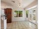Bright dining area with tiled floors, views of the backyard, and access to outdoor space at 8540 W Ocotillo Rd, Glendale, AZ 85305