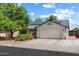 Charming single-story home featuring a two-car garage, solar panels, and well-maintained landscaping at 8540 W Ocotillo Rd, Glendale, AZ 85305