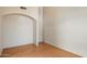 Versatile flex space with tile flooring, neutral paint, and an arched doorway at 8540 W Ocotillo Rd, Glendale, AZ 85305
