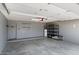 Clean, spacious garage with shelves and plenty of room for parking and storage at 8540 W Ocotillo Rd, Glendale, AZ 85305