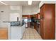 Spacious kitchen featuring stainless steel appliances, granite counters, modern tile backsplash and tile flooring at 8540 W Ocotillo Rd, Glendale, AZ 85305