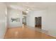 Spacious living room with vaulted ceilings, wood-look flooring, and ample natural light at 8540 W Ocotillo Rd, Glendale, AZ 85305