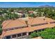 Stunning aerial view of the community showcasing well-maintained red-tiled roofs, lush landscaping, and community amenities at 8653 E Royal Palm Rd # 1030, Scottsdale, AZ 85258