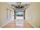 Spacious, painted single-car garage featuring an overhead door and shelving, with ample room for parking and storage at 8653 E Royal Palm Rd # 1030, Scottsdale, AZ 85258