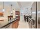 Elegant kitchen with granite counters, stainless appliances, and eat in table at 8653 E Royal Palm Rd # 1030, Scottsdale, AZ 85258